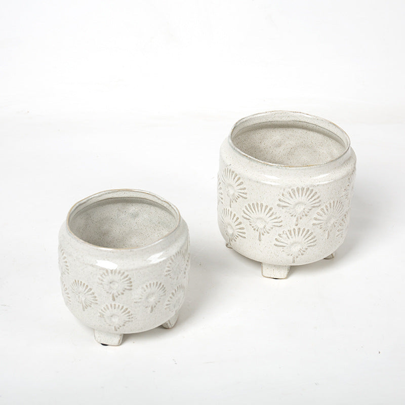 Decorative ceramic flower pot on legs