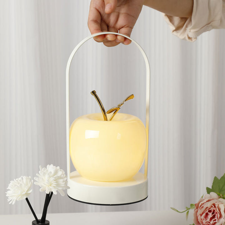 Ceramic apple-shaped ambient table lamp with brass handle