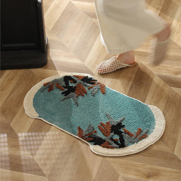 Tufted bath mat rug with botanical textured design