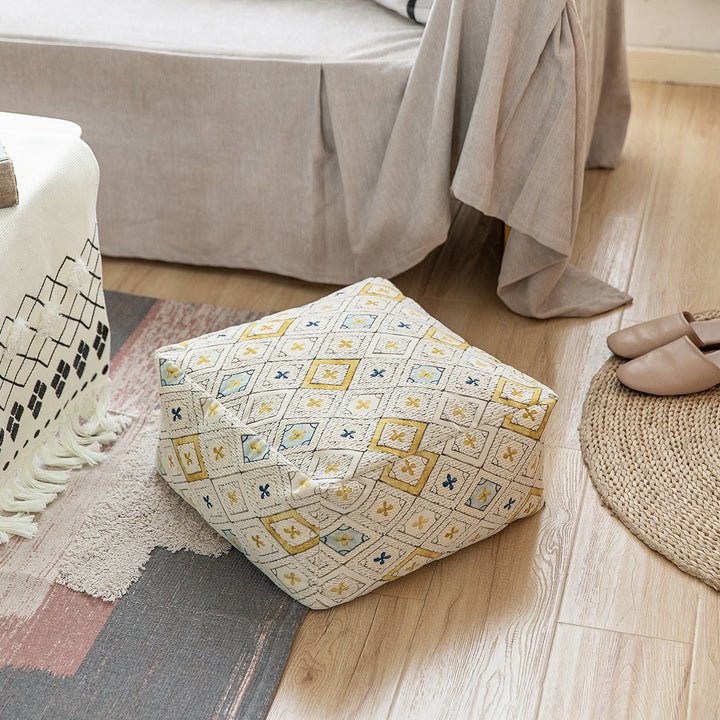 Seating pouf made of woven cotton blend with quilted diamond relief