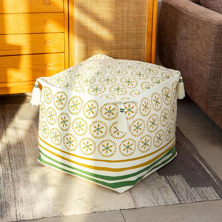 Square pouf seat cube made of cotton blend fabric with boho embroidery and tassels
