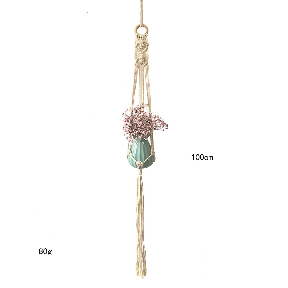 Macrame plant hanger with decorative tassels