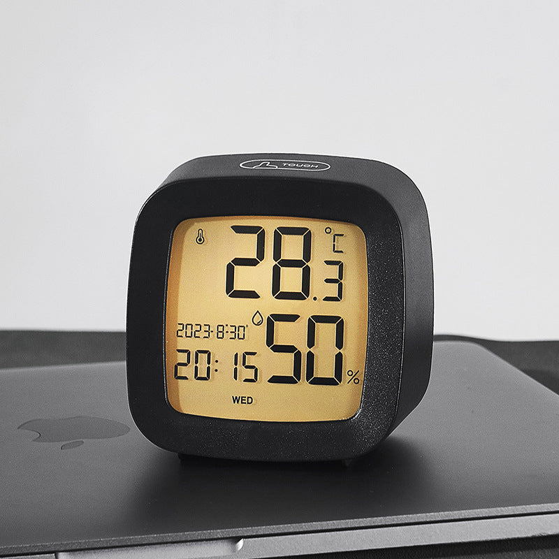Digital alarm clock with temperature and hygrometer function