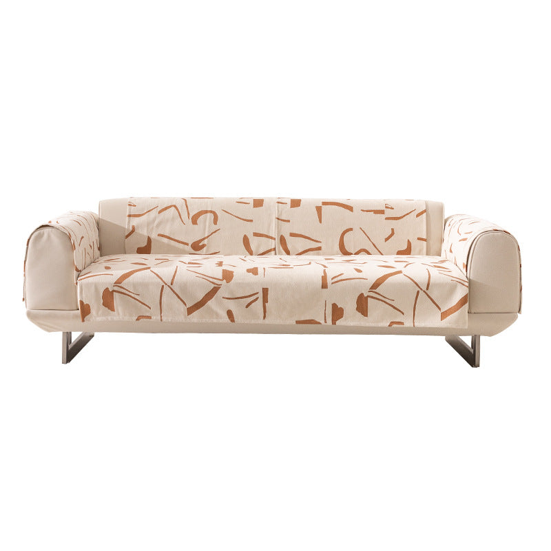 Stretch sofa cover with abstract brushstroke print and elastic waistband