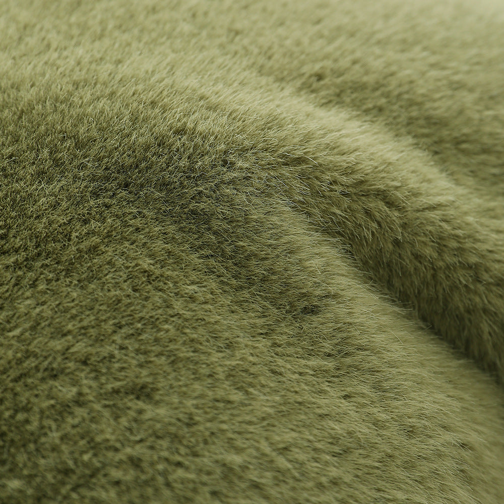 Plush pillow with artificial fur cover and cuddly inner foam filling