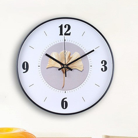 Wall clock with elegant leaf pattern