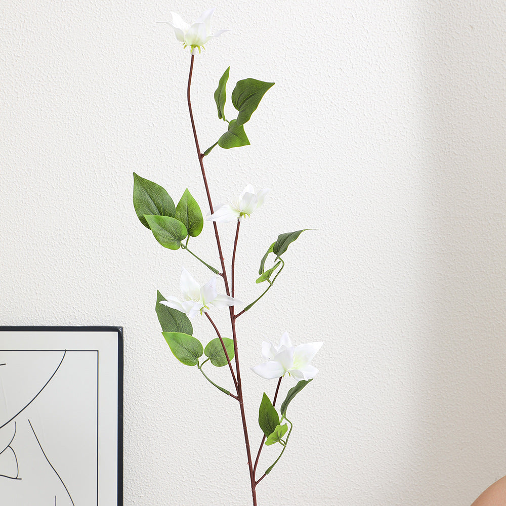 Artificial flower branch with lifelike fig tree leaves