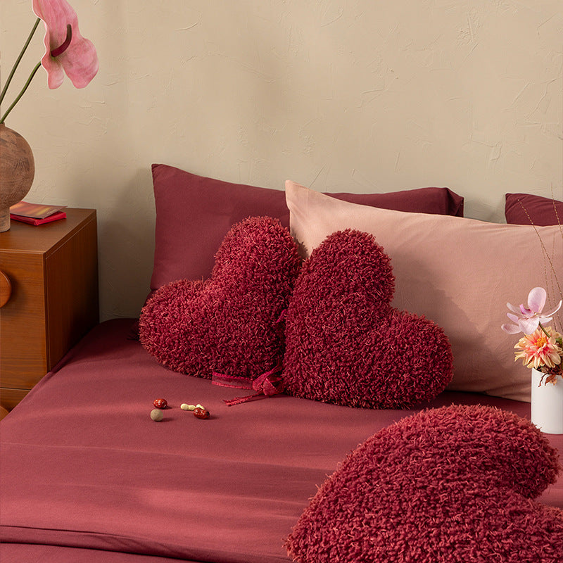 Decorative bow accent cushion with soft-touch cover