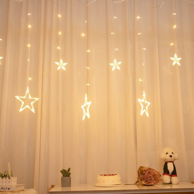 Hanging star and crescent moon LED curtain string lights for bedroom ambiance