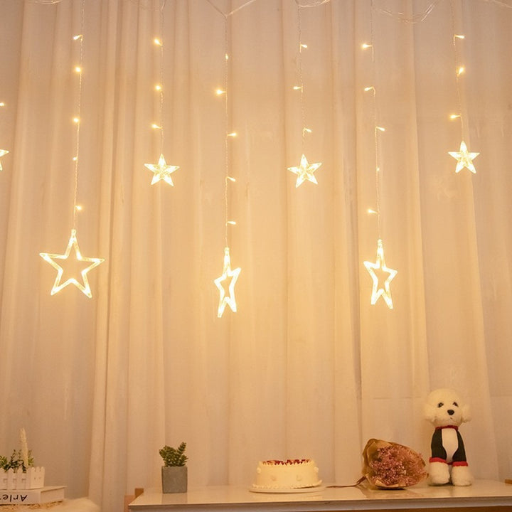 Hanging star and crescent moon LED curtain string lights for bedroom ambiance