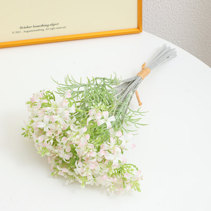 Decorative artificial flower arrangement