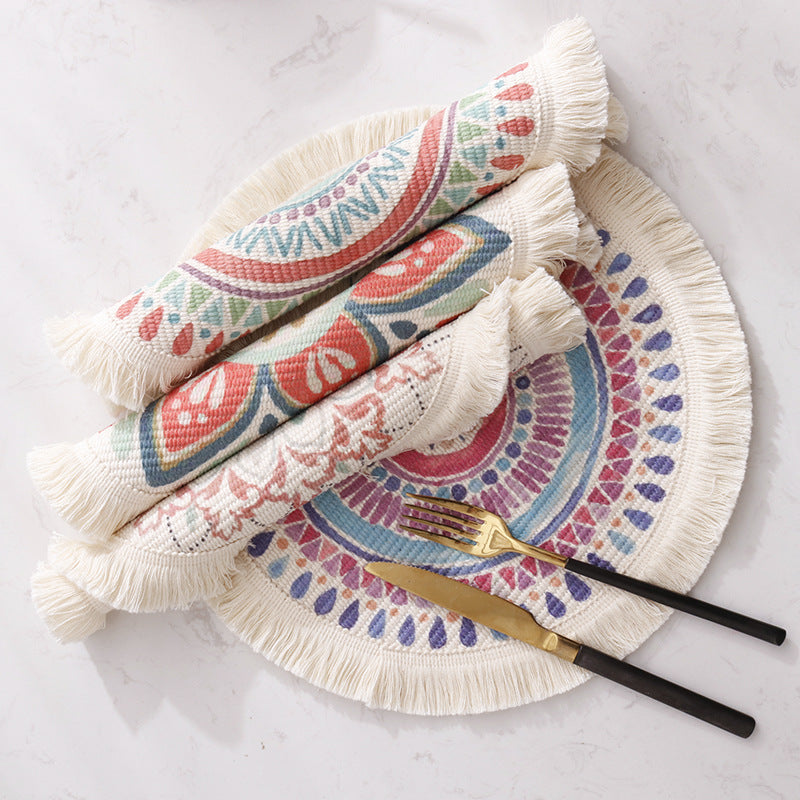 Round flat-woven cotton rug with mandala design and decorative fringes