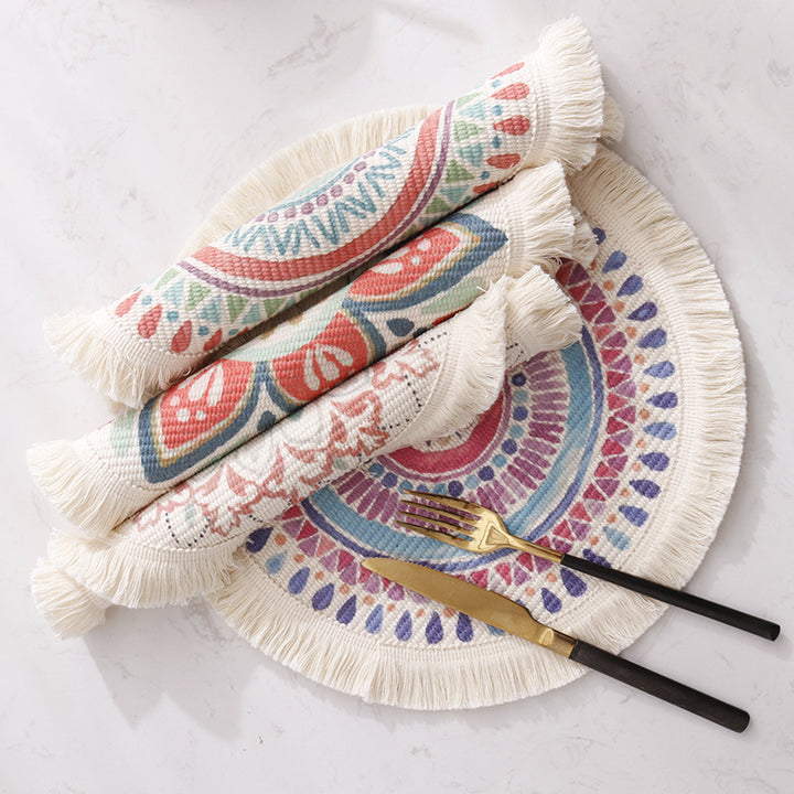 Round flat-woven cotton rug with mandala design and decorative fringes