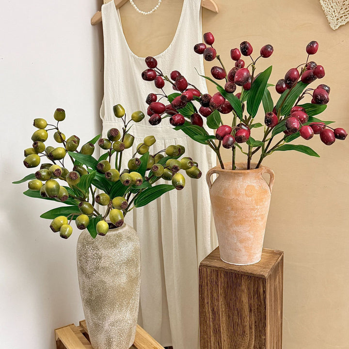 Artificial branch with olives