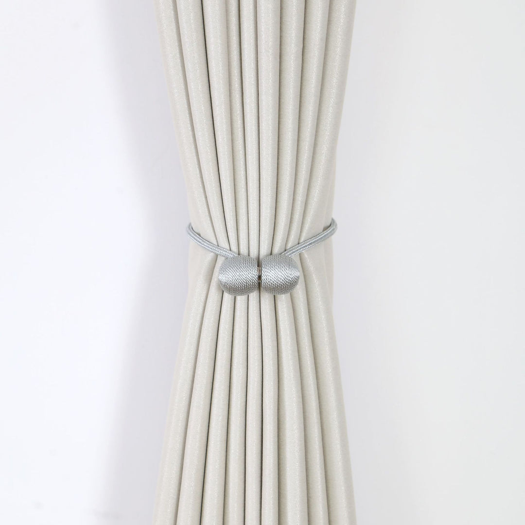 Decorative curtain tieback