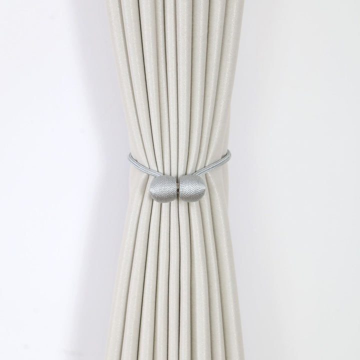 Decorative curtain tieback