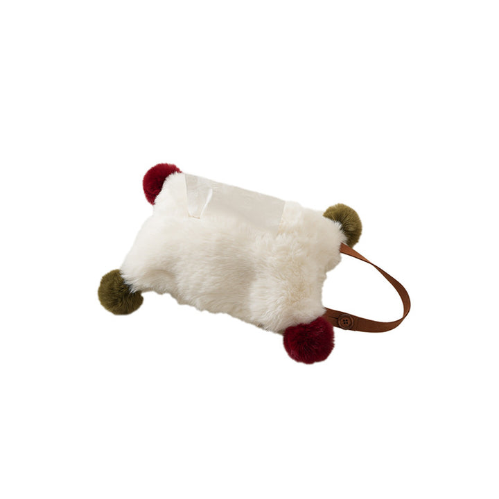 Handy tissue storage made of faux fur with leather handle and pompom