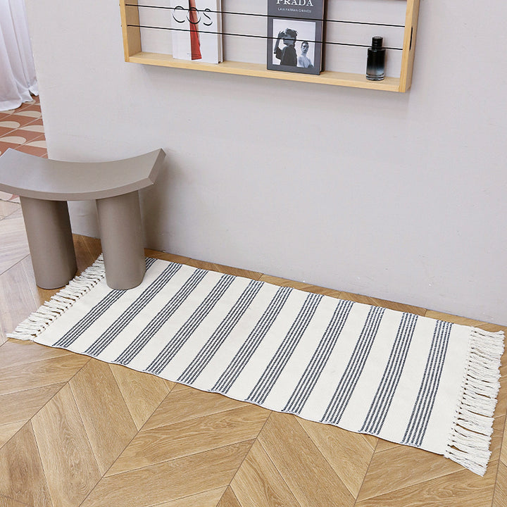 Woven cotton blend bath mat in buffalo check with flat weave structure
