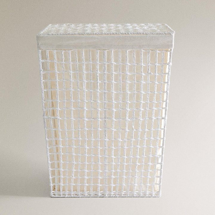 Modern laundry basket with embroidered pattern