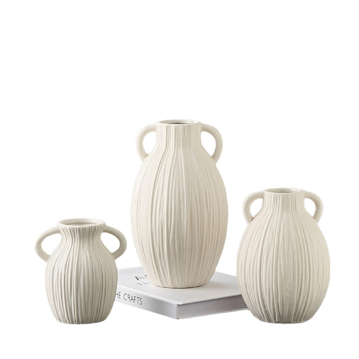 Decorative ceramic vase with artistic ribbed pattern
