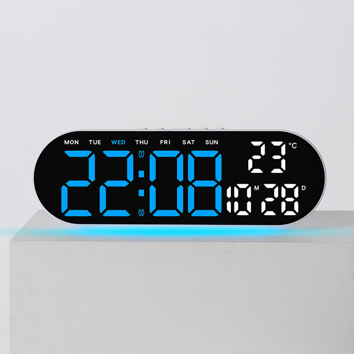 Digital alarm clock with multifunctional LED display and integrated thermometer function