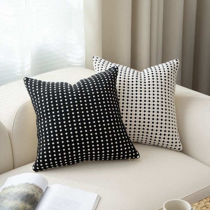 Woven decorative pillow with textured dot tufting