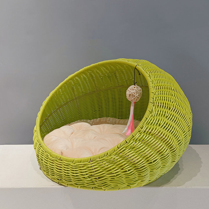 Cozy cat bed made of woven natural material