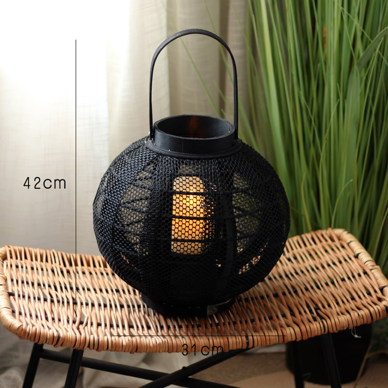 Elegant metal lantern with net design