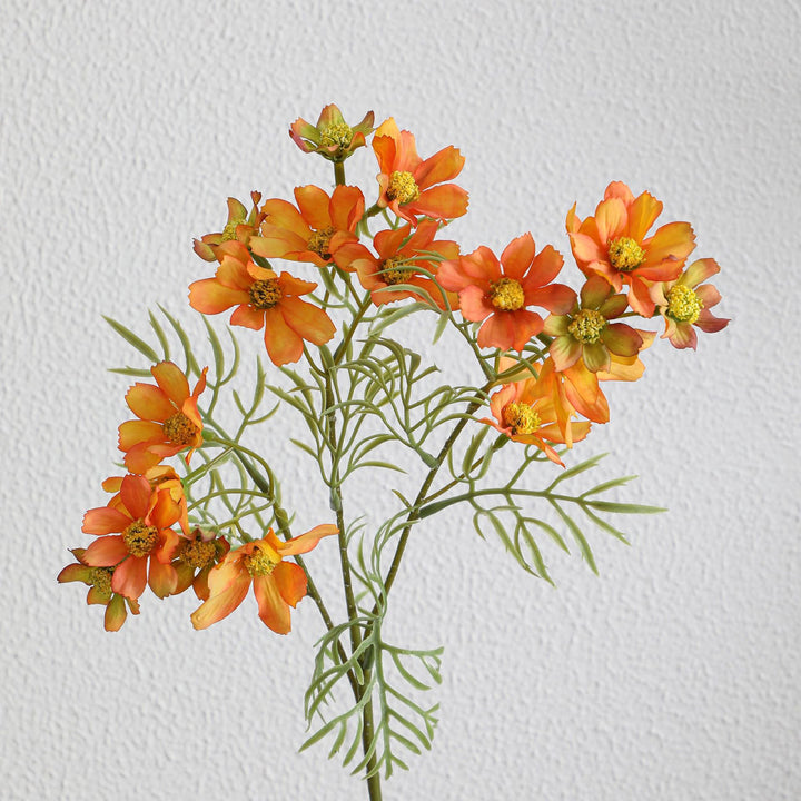 Artificial flower branch with bright pink flowers