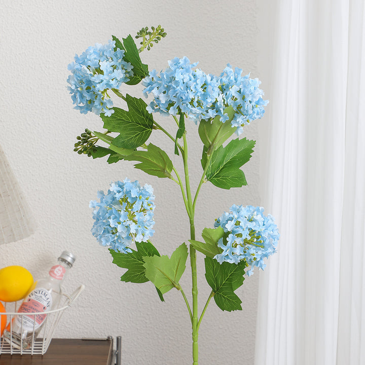Artificial hydrangea branch with vibrant flowers and detailed leaves