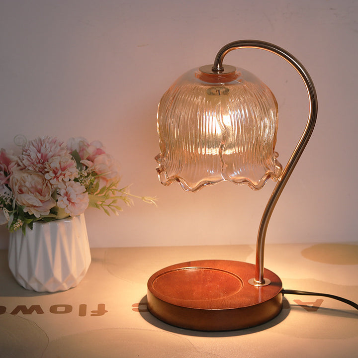 Decorative table lamp made of glass