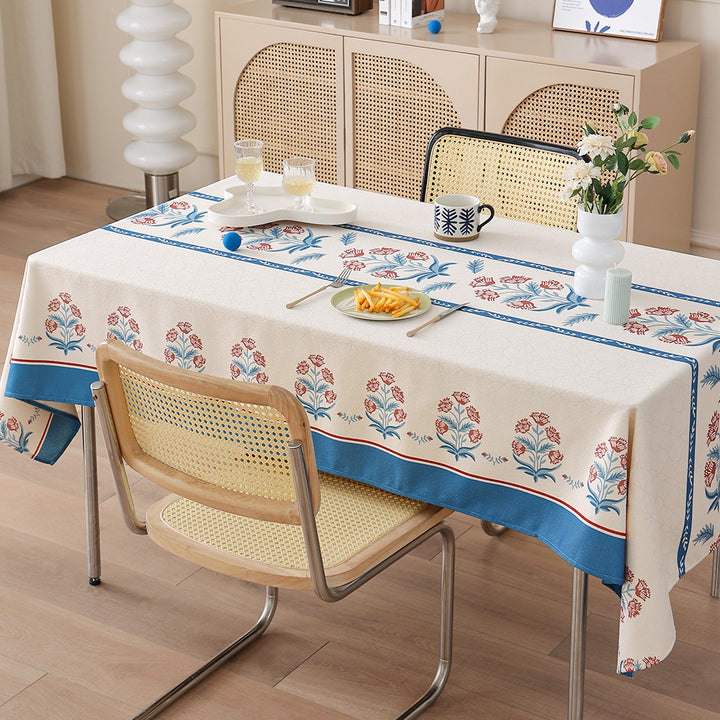 Water-repellent rectangular tablecloth with paisley pattern and coated cotton look