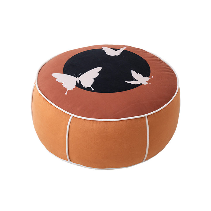 round floor sitting pouf with butterfly motif and sturdy canvas cover