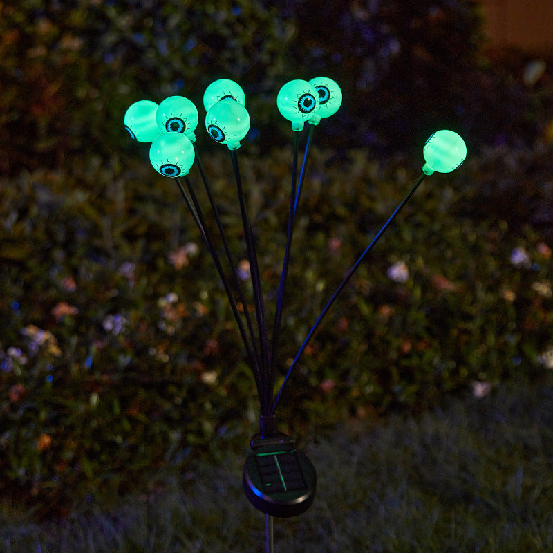 Creepy garden lights with eye motif