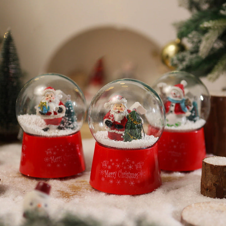 Snow globe with Santa Claus and Christmas tree