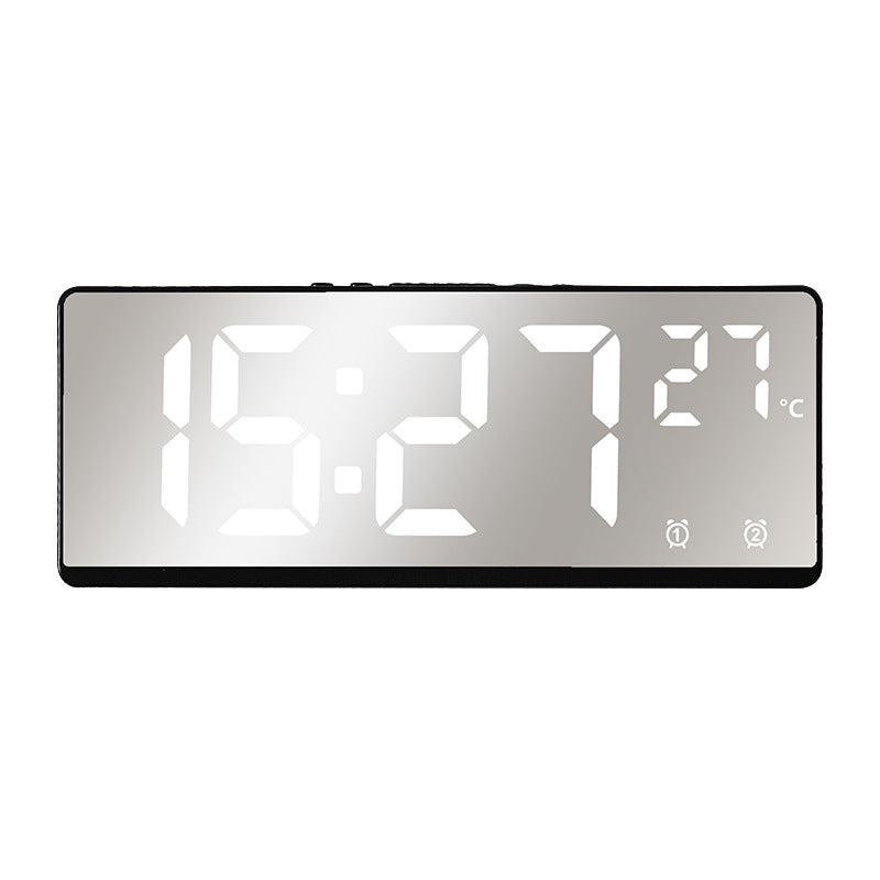 Digital alarm clock with temperature sensor and mirror function