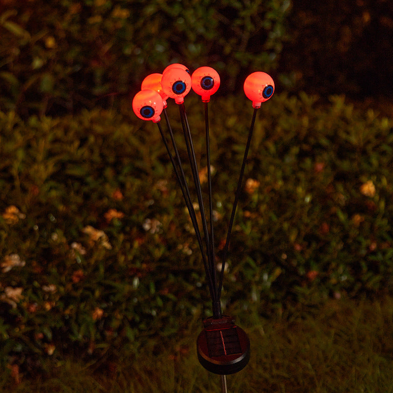 Creepy garden lights with eye motif