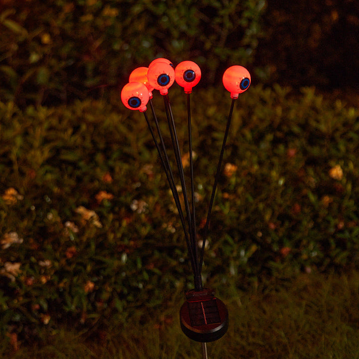 Creepy garden lights with eye motif