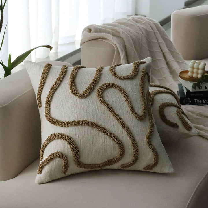 Square decorative cushion cover with hand-tufted loop appliqué and fine linen look