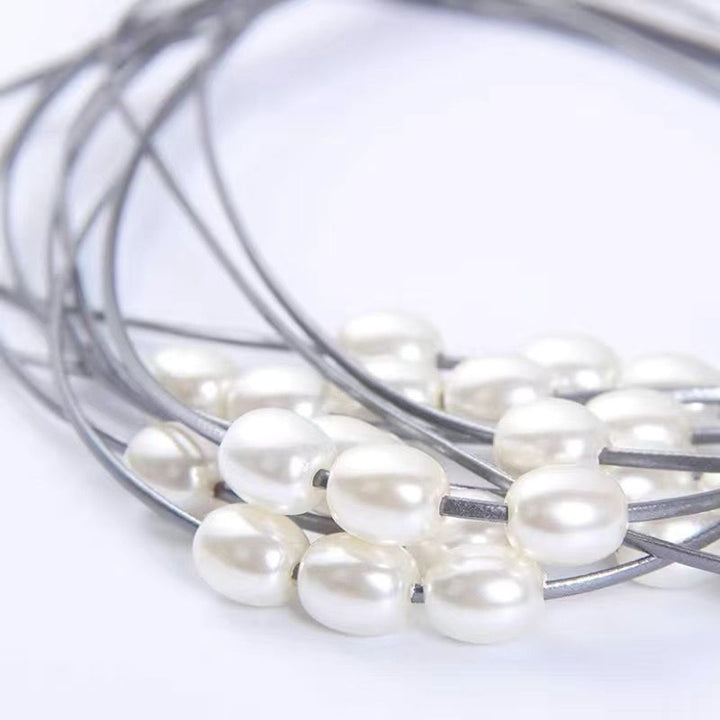 Decorative curtain holder with bead accent