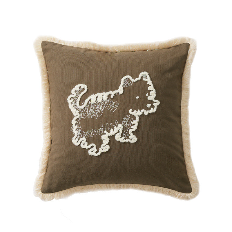 Decorative cushion cover with embroidered dog motif and fringed border