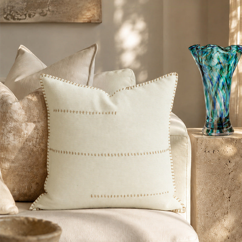 Square decorative pillow with two-tone knit and linen fabric