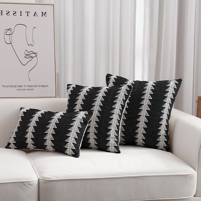 Decorative woven cushion cover with ethnic jacquard, tassels and concealed zipper