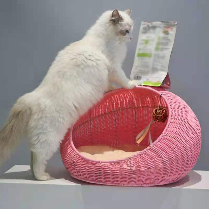 Cozy cat bed made of woven natural material