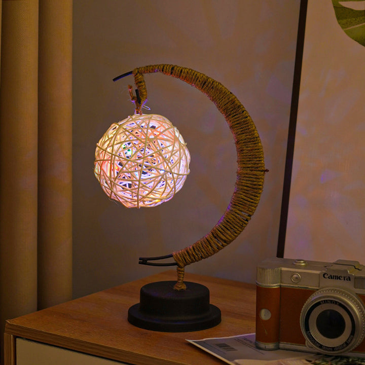 Decorative glass apple LED table lamp with moon-shaped rope-wrapped stand