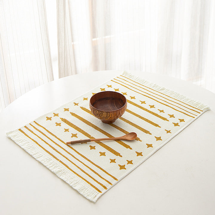 Woven rectangular table set made of cotton blend with central diamond band