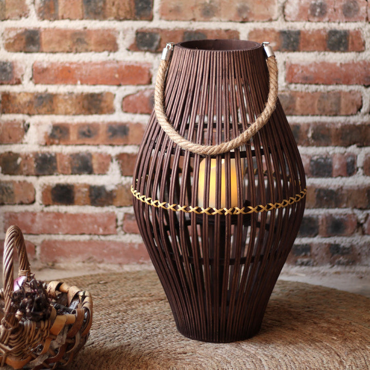 Stylish lantern made of rattan with wooden frame