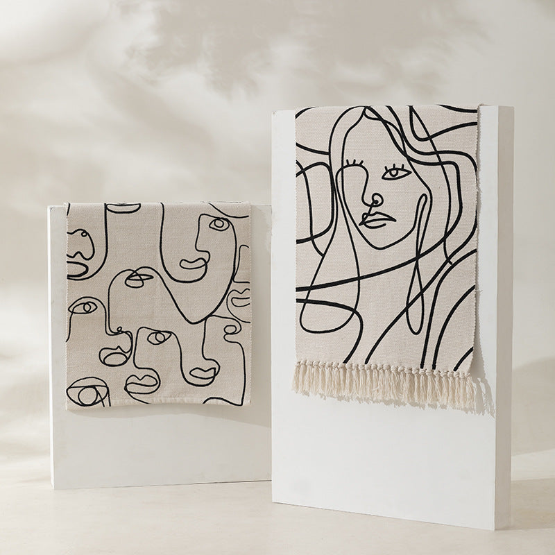 Woven cotton tabletop set with abstract line art