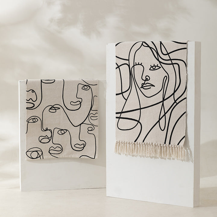 Woven cotton tabletop set with abstract line art