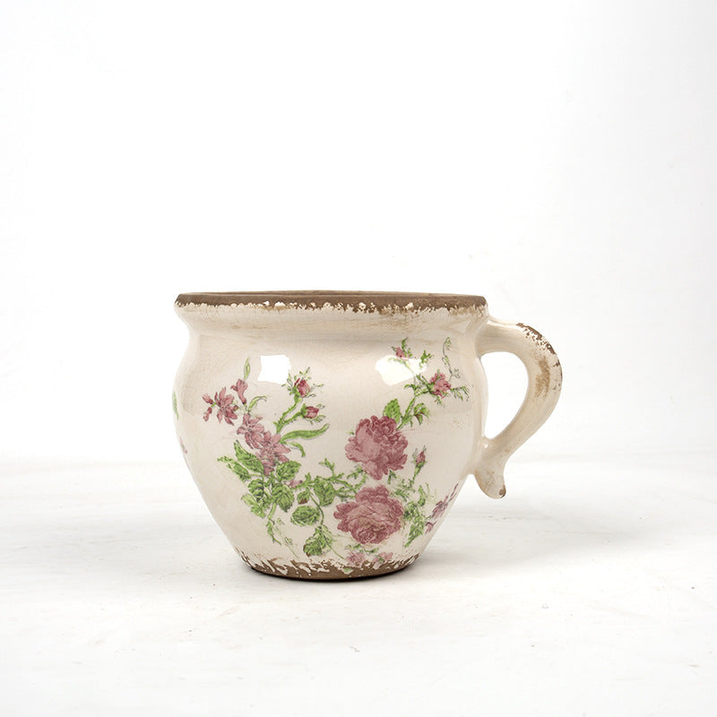 Decorative ceramic pot with floral pattern